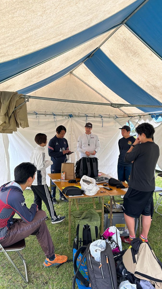 A briefing in a tent.